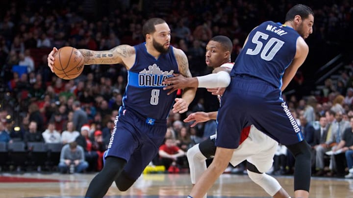Dec 21, 2016; Portland, OR, USA; Dallas Mavericks guard Deron Williams (8) dribbles around Portland Trail Blazers guard Damian Lillard (0) during the first quarter at the Moda Center. Mandatory Credit: Craig Mitchelldyer-USA TODAY Sports