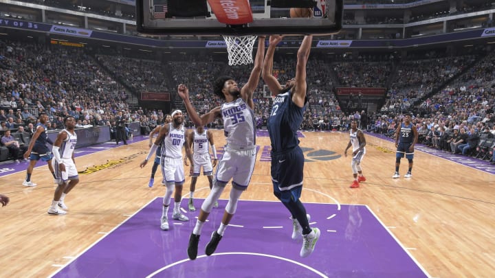 SACRAMENTO, CA – NOVEMBER 9: Karl-Anthony Towns #32 of the Minnesota Timberwolves goes up for the shot against Marvin Bagley III #35 of the Sacramento Kings on November 9, 2018 at Golden 1 Center in Sacramento, California. NOTE TO USER: User expressly acknowledges and agrees that, by downloading and or using this photograph, User is consenting to the terms and conditions of the Getty Images Agreement. Mandatory Copyright Notice: Copyright 2018 NBAE (Photo by Rocky Widner/NBAE via Getty Images)