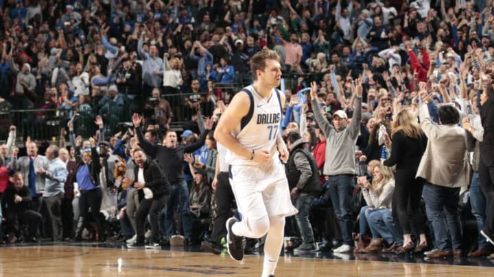 DALLAS, TX - DECEMBER 8: Luka Doncic #77 of the Dallas Mavericks reacts during a game against the Houston Rockets on December 8, 2018 at the American Airlines Center in Dallas, Texas. NOTE TO USER: User expressly acknowledges and agrees that, by downloading and or using this photograph, User is consenting to the terms and conditions of the Getty Images License Agreement. Mandatory Copyright Notice: Copyright 2018 NBAE (Photo by Glenn James/NBAE via Getty Images)