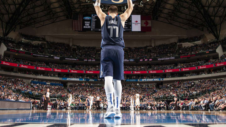 DALLAS, TX – DECEMBER 26: Luka Doncic #77 of the Dallas Mavericks celebrates after play against the New Orleans Pelicans on December 26, 2018 at the American Airlines Center in Dallas, Texas. NOTE TO USER: User expressly acknowledges and agrees that, by downloading and or using this photograph, User is consenting to the terms and conditions of the Getty Images License Agreement. Mandatory Copyright Notice: Copyright 2018 NBAE (Photo by Glenn James/NBAE via Getty Images)