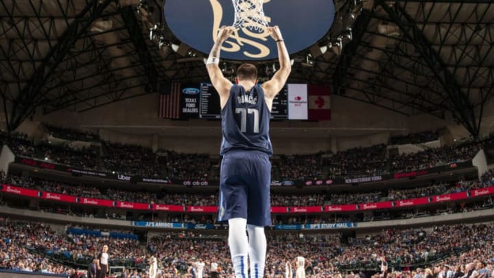 DALLAS, TX - DECEMBER 26: Luka Doncic #77 of the Dallas Mavericks celebrates after play against the New Orleans Pelicans on December 26, 2018 at the American Airlines Center in Dallas, Texas. NOTE TO USER: User expressly acknowledges and agrees that, by downloading and or using this photograph, User is consenting to the terms and conditions of the Getty Images License Agreement. Mandatory Copyright Notice: Copyright 2018 NBAE (Photo by Glenn James/NBAE via Getty Images)