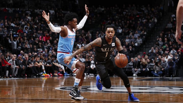 NEW YORK, NY – JANUARY 21: D’Angelo Russell #1 of the Brooklyn Nets dribbles the ball during the game against De’Aaron Fox #5 of the Sacramento Kings on January 21, 2019 at Barclays Center in New York, NY. NOTE TO USER: User expressly acknowledges and agrees that, by downloading and or using this photograph, User is consenting to the terms and conditions of the Getty Images License Agreement. Mandatory Copyright Notice: Copyright 2019 NBAE (Photo by Jeff Haynes/NBAE via Getty Images)