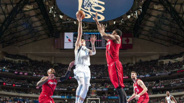 DALLAS, TX - FEBRUARY 10: Luka Doncic #77 of the Dallas Mavericks shoots layup against the Portland Trail Blazers on February 10, 2019 at the American Airlines Center in Dallas, Texas. NOTE TO USER: User expressly acknowledges and agrees that, by downloading and or using this photograph, User is consenting to the terms and conditions of the Getty Images License Agreement. Mandatory Copyright Notice: Copyright 2019 NBAE (Photo by Glenn James/NBAE via Getty Images)