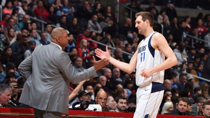LOS ANGELES, CA - FEBRUARY 25: Head Coach Doc Rivers of the LA Clippers and Dirk Nowitzki #41 of the Dallas Mavericks high-five on February 25, 2019 at STAPLES Center in Los Angeles, California. NOTE TO USER: User expressly acknowledges and agrees that, by downloading and/or using this Photograph, user is consenting to the terms and conditions of the Getty Images License Agreement. Mandatory Copyright Notice: Copyright 2019 NBAE (Photo by Adam Pantozzi/NBAE via Getty Images)