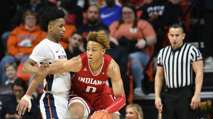 CHAMPAIGN, IL – MARCH 07: Big Ten referee Larry Scirotto looks on as Illinois Fighting Illini guard Trent Frazier (1) guards Indiana Hoosiers guard Romeo Langford (0) during the college basketball game between the Indiana Hoosiers and the Illinois Fighting Illini on March 7, 2019, at the State Farm Center in Champaign, Illinois. (Photo by Michael Allio/Icon Sportswire via Getty Images)