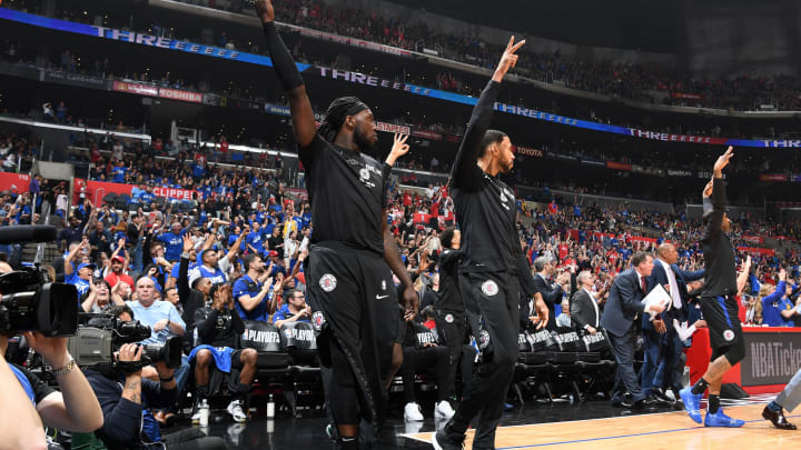 LOS ANGELES, CA – APRIL 26: Montrezl Harrell #5 and Garrett Temple #17 of the LA Clippers react to a play against the Golden State Warriors during Game Six of Round One of the 2019 NBA Playoffs on April 26, 2019 at STAPLES Center in Los Angeles, California. NOTE TO USER: User expressly acknowledges and agrees that, by downloading and/or using this photograph, user is consenting to the terms and conditions of the Getty Images License Agreement. Mandatory Copyright Notice: Copyright 2019 NBAE (Photo by Andrew D. Bernstein/NBAE via Getty Images)