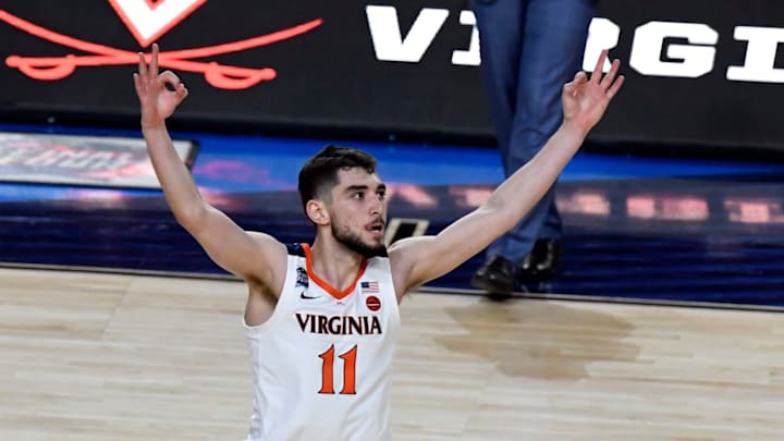 MINNEAPOLIS, MINNESOTA – APRIL 08: Ty Jerome #11 of the Virginia Cavaliers celebrates the play against the Texas Tech Red Raiders in the first half during the 2019 NCAA men’s Final Four National Championship game at U.S. Bank Stadium on April 08, 2019 in Minneapolis, Minnesota. (Photo by Hannah Foslien/Getty Images)