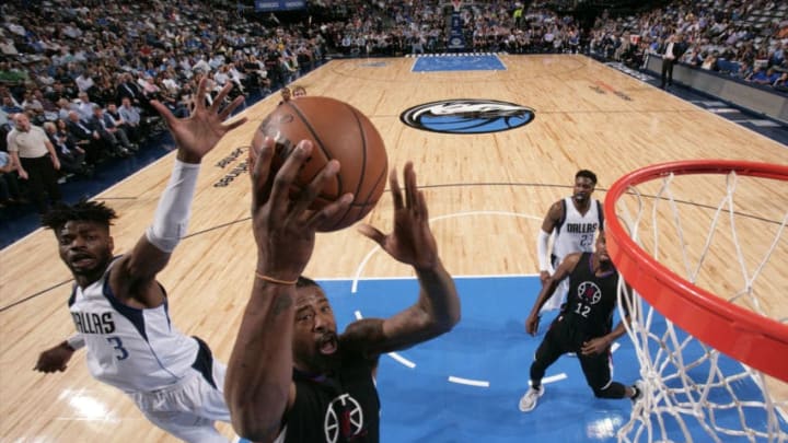 DALLAS, TX - MARCH 23: DeAndre Jordan #6 of the Los Angeles Clippers goes for a lay up during the game against the Dallas Mavericks on March 23, 2017 at the American Airlines Center in Dallas, Texas. NOTE TO USER: User expressly acknowledges and agrees that, by downloading and or using this photograph, User is consenting to the terms and conditions of the Getty Images License Agreement. Mandatory Copyright Notice: Copyright 2017 NBAE (Photo by Glenn James/NBAE via Getty Images)