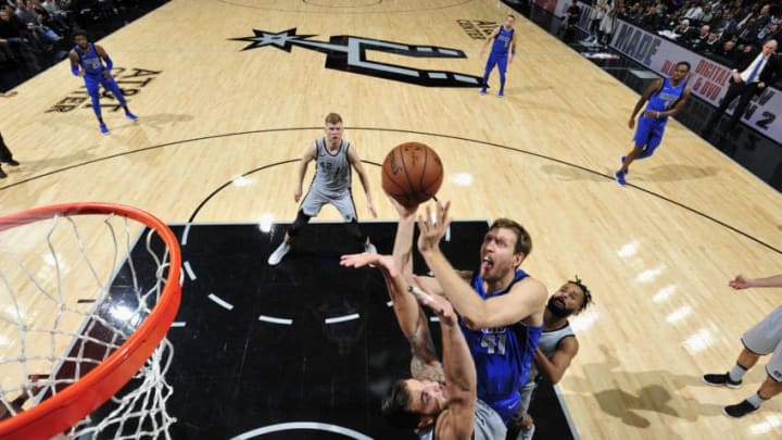 ANTONIO, TX - DECEMBER 16: Dirk Nowitzki #41 of the Dallas Mavericks goes to the basket against the San Antonio Spurs on December 16, 2017 at the AT&T Center in San Antonio, Texas. NOTE TO USER: User expressly acknowledges and agrees that, by downloading and or using this photograph, user is consenting to the terms and conditions of the Getty Images License Agreement. Mandatory Copyright Notice: Copyright 2017 NBAE (Photos by Mark Sobhani/NBAE via Getty Images)