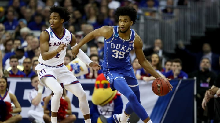 OMAHA, NE – MARCH 25: Marvin Bagley III #35 of the Duke Blue Devils dribbles against Devonte’ Graham #4 of the Kansas Jayhawks during the first half in the 2018 NCAA Men’s Basketball Tournament Midwest Regional at CenturyLink Center on March 25, 2018 in Omaha, Nebraska. (Photo by Jamie Squire/Getty Images)