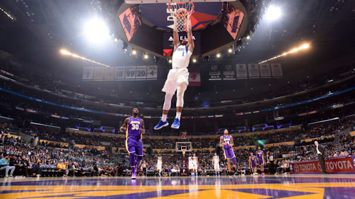 LOS ANGELES, CA - MARCH 28: Dennis Smith Jr. #1 of the Dallas Mavericks dunks the ball during the game against the Los Angeles Lakers on March 28, 2018 at STAPLES Center in Los Angeles, California. NOTE TO USER: User expressly acknowledges and agrees that, by downloading and/or using this Photograph, user is consenting to the terms and conditions of the Getty Images License Agreement. Mandatory Copyright Notice: Copyright 2018 NBAE (Photo by Andrew D. Bernstein/NBAE via Getty Images)