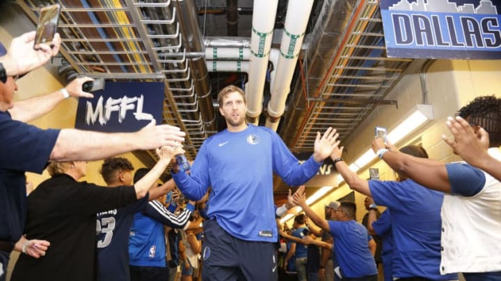 DALLAS, TX - OCTOBER 2: Dirk Nowitzki #41 of the Dallas Mavericks gets introduced before the preseason game against the Milwaukee Bucks on October 2, 2017 at the American Airlines Center in Dallas, Texas. NOTE TO USER: User expressly acknowledges and agrees that, by downloading and or using this photograph, User is consenting to the terms and conditions of the Getty Images License Agreement. Mandatory Copyright Notice: Copyright 2017 NBAE (Photo by Danny Bollinger/NBAE via Getty Images)