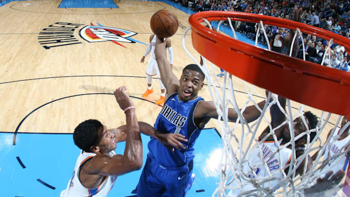 OKLAHOMA CITY, OK - NOVEMBER 12: Dennis Smith Jr. #1 of the Dallas Mavericks goes to the basket against the Oklahoma City Thunder on November 12, 2017 at Chesapeake Energy Arena in Oklahoma City, Oklahoma. NOTE TO USER: User expressly acknowledges and agrees that, by downloading and or using this photograph, User is consenting to the terms and conditions of the Getty Images License Agreement. Mandatory Copyright Notice: Copyright 2017 NBAE (Photo by Layne Murdoch/NBAE via Getty Images) OKLAHOMA CITY, OK - NOVEMBER 12: Dennis Smith Jr. #1 of the Dallas Mavericks goes to the basket against the Oklahoma City Thunder on November 12, 2017 at Chesapeake Energy Arena in Oklahoma City, Oklahoma. NOTE TO USER: User expressly acknowledges and agrees that, by downloading and or using this photograph, User is consenting to the terms and conditions of the Getty Images License Agreement. Mandatory Copyright Notice: Copyright 2017 NBAE (Photo by Layne Murdoch/NBAE via Getty Images)