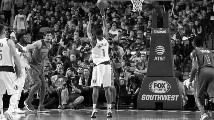 DALLAS, TX - DECEMBER 20: (EDITORS NOTE: Image has been converted to black and white.) Dennis Smith Jr. #1 of the Dallas Mavericks shoots a foul shot during the game against the Detroit Pistons on December 20, 2017 at the American Airlines Center in Dallas, Texas. NOTE TO USER: User expressly acknowledges and agrees that, by downloading and or using this photograph, User is consenting to the terms and conditions of the Getty Images License Agreement. Mandatory Copyright Notice: Copyright 2017 NBAE (Photo by Danny Bollinger/NBAE via Getty Images)