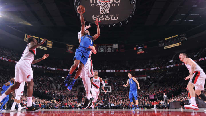 PORTLAND, OR – JANUARY 20: Dennis Smith Jr. #1 of the Dallas Mavericks drives to the basket against the Portland Trail Blazers on January 20, 2018 at the Moda Center Arena in Portland, Oregon. NOTE TO USER: User expressly acknowledges and agrees that, by downloading and or using this photograph, user is consenting to the terms and conditions of the Getty Images License Agreement. Mandatory Copyright Notice: Copyright 2018 NBAE (Photo by Sam Forencich/NBAE via Getty Images)