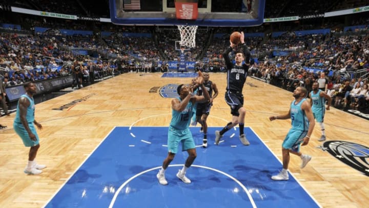 ORLANDO, FL - APRIL 6: Mario Hezonja #8 of the Orlando Magic shoots the ball against the Charlotte Hornets on April 6, 2018 at Amway Center in Orlando, Florida. NOTE TO USER: User expressly acknowledges and agrees that, by downloading and or using this photograph, User is consenting to the terms and conditions of the Getty Images License Agreement. Mandatory Copyright Notice: Copyright 2018 NBAE (Photo by Fernando Medina/NBAE via Getty Images)