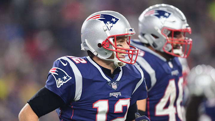 FOXBOROUGH, MA - DECEMBER 02: Tom Brady #12 of the New England Patriots celebrates after a rushing touchdown by James Develin #46 during the fourth quarter against the Minnesota Vikings at Gillette Stadium on December 2, 2018 in Foxborough, Massachusetts. (Photo by Billie Weiss/Getty Images)