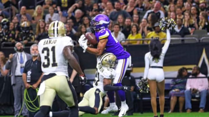 NEW ORLEANS, LA - AUGUST 09: Minnesota Vikings wide receiver Bisi Johnson (81) catches a touchdown pass against New Orleans Saints defensive back Patrick Robinson (21)during an NFL preseason game between the New Orleans Saints and the Minnesota Vikings on August 9, 2019 at the Mercedes-Benz Superdome in New Orleans, LA. (Photo by Stephen Lew/Icon Sportswire via Getty Images)