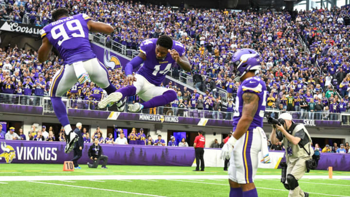 MINNEAPOLIS, MN - OCTOBER 13: Minnesota Vikings Defensive End Danielle Hunter (99) and Minnesota Vikings Wide Receiver Stefon Diggs (14) greet each other with flying kicks before a game between the Philadelphia Eagles and Minnesota Vikings on October 13, 2019 at U.S. Bank Stadium in Minneapolis, MN.(Photo by Nick Wosika/Icon Sportswire via Getty Images)