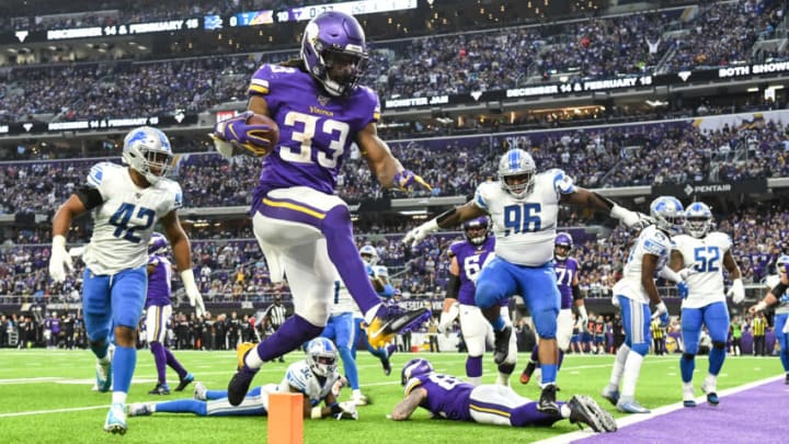 MINNEAPOLIS, MN - DECEMBER 08: Minnesota Vikings Running Back Dalvin Cook (33) leaps into the endzone after a 3-yard run for a 2nd quarter touchdown during a game between the Detroit Lions and Minnesota Vikings on December 8, 2019 at U.S. Bank Stadium in Minneapolis, MN.(Photo by Nick Wosika/Icon Sportswire via Getty Images)