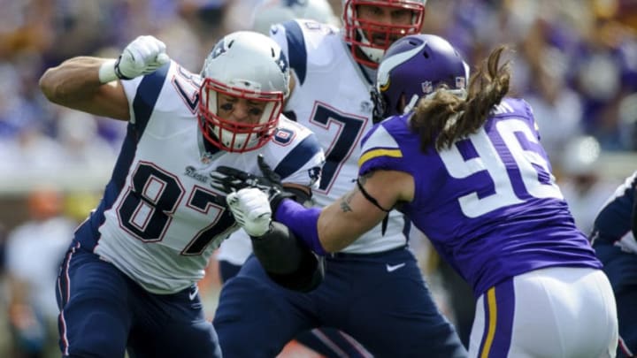 MINNEAPOLIS, MN - SEPTEMBER 14: Rob Gronkowski #87 of the New England Patriots blocks Brian Robison #96 of the Minnesota Vikings during the game on September 14, 2014 at TCF Bank Stadium in Minneapolis, Minnesota. (Photo by Hannah Foslien/Getty Images)
