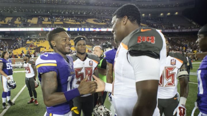 MINNEAPOLIS, MN - AUGUST 15: Stefon Diggs #14 of the Minnesota Vikings and Jameis Winston #3 of the Tampa Bay Buccaneers shake hands after the preseason game on August 15, 2015 at TCF Bank Stadium in Minneapolis, Minnesota. The Vikings defeated the Buccaneers 26-16. (Photo by Hannah Foslien/Getty Images)