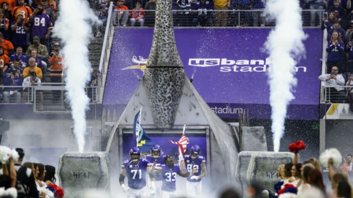 MINNEAPOLIS, MN - NOVEMBER 17: Dalvin Cook #33 of the Minnesota Vikings leads the team out of the tunnel during player introductions before the game against the Denver Broncos at U.S. Bank Stadium on November 17, 2019 in Minneapolis, Minnesota. (Photo by Stephen Maturen/Getty Images)