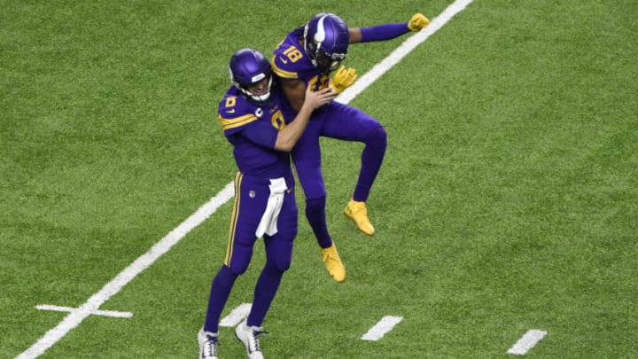 (Photo by Stephen Maturen/Getty Images) Kirk Cousins and Justin Jefferson