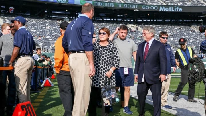 Dec 13, 2015; Tennessee Titans controlling owner Amy Adams Strunk and interim head coach Mike Mularkey meet before their game against the New York Jets East Rutherford, NJ, USA; at MetLife Stadium. Mandatory Credit: Vincent Carchietta-USA TODAY Sports