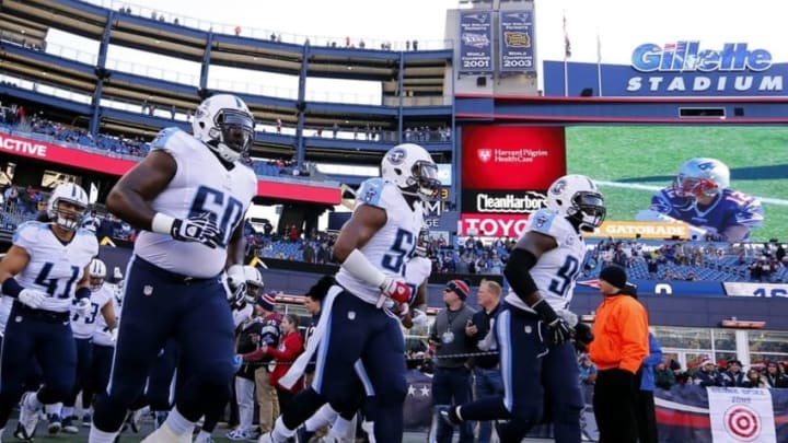 Dec 20, 2015; Foxborough, MA, USA; Tennessee Titans guard Quinton Spain (60), inside linebacker Zach Brown (55) and outside linebacker Brian Orakpo (98) take the field before their game against the New England Patriots at Gillette Stadium. Mandatory Credit: Winslow Townson-USA TODAY Sports