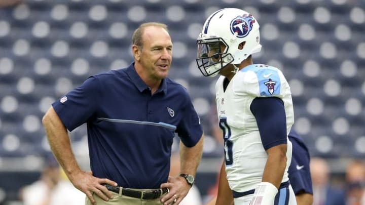 Oct 2, 2016; Houston, TX, USA; Tennessee Titans head coach Mike Mularkey (left) speaks with quarterback Marcus Mariota (8) before the game against the Houston Texans at NRG Stadium. Mandatory Credit: Kevin Jairaj-USA TODAY Sports