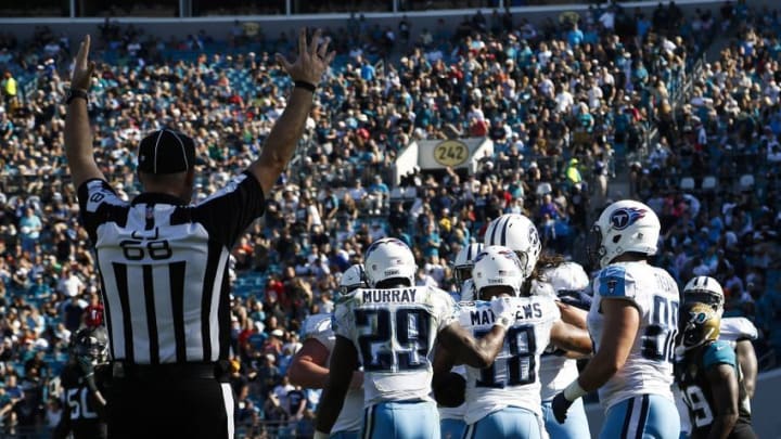 Dec 24, 2016; Jacksonville, FL, USA; Tennessee Titans wide receiver Rishard Matthews (18) celebrates with his teammates after scoring a touchdown in the second quarter against the Jacksonville Jaguars at EverBank Field. Mandatory Credit: Logan Bowles-USA TODAY Sports