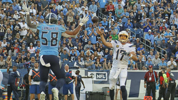 NASHVILLE, TENNESSEE – OCTOBER 20: Harold Landry #58 of the Tennessee Titans tries to block a pass by quarterback Philip Rivers #17 of the Los Angeles Chargers that was caught for a touchdown during the first half at Nissan Stadium on October 20, 2019 in Nashville, Tennessee. (Photo by Frederick Breedon/Getty Images)