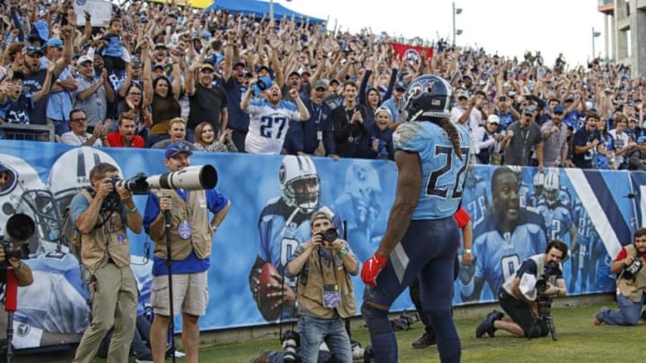 NASHVILLE, TENNESSEE - OCTOBER 20: Fans cheer after Derrick Henry #22 of the Tennessee Titans scores a touchdown against the Los Angeles Chargers during the second half at Nissan Stadium on October 20, 2019 in Nashville, Tennessee. (Photo by Frederick Breedon/Getty Images)