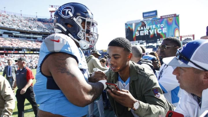 NASHVILLE, TENNESSEE - NOVEMBER 10: Jeffery Simmons #98 of the Tennessee Titans shakes hands with a fan prior to a game against the Kansas City Chiefs at Nissan Stadium on November 10, 2019 in Nashville, Tennessee. (Photo by Frederick Breedon/Getty Images)