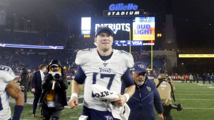 FOXBOROUGH, MASSACHUSETTS - JANUARY 04: Ryan Tannehill #17 of the Tennessee Titans celebrates their 20-13 win over the New England Patriots in the AFC Wild Card Playoff game at Gillette Stadium on January 04, 2020 in Foxborough, Massachusetts. (Photo by Elsa/Getty Images)