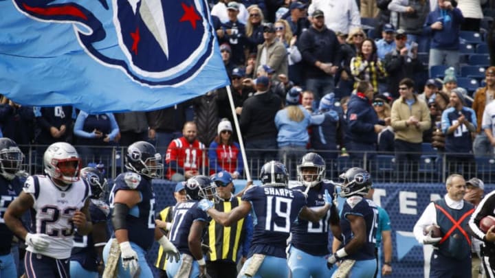 NASHVILLE, TN - NOVEMBER 11: Tajae Sharpe #19 of the Tennessee Titans celebrates scoring a touchdown against the New England Patriots with teamamtes at Nissan Stadium on November 11, 2018 in Nashville, Tennessee. (Photo by Frederick Breedon/Getty Images)