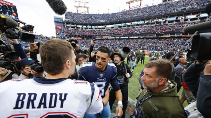 NASHVILLE, TN - NOVEMBER 11: Tom Brady #12 of the New England Patriots and Marcus Mariota #8 of the Tennessee Titans shake hands after the game at Nissan Stadium on November 11, 2018 in Nashville, Tennessee. (Photo by Wesley Hitt/Getty Images)