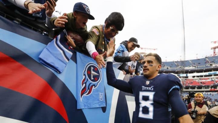 NASHVILLE, TN - NOVEMBER 11: Marcus Mariota #8 of the Tennessee Titans shakes hands with fans after beating the New England Patriots at Nissan Stadium on November 11, 2018 in Nashville, Tennessee. (Photo by Wesley Hitt/Getty Images)