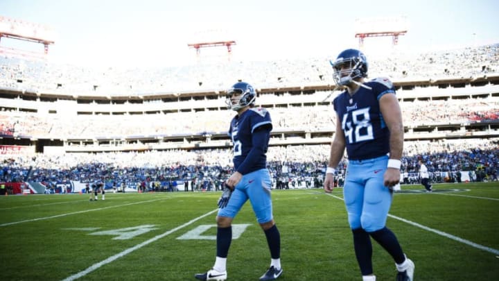 NASHVILLE, TN - DECEMBER 2: Beau Brinkley #48 of the Tennessee Titans and Brett Kern #6 walk off the field before kickoff against the New York Jets at Nissan Stadium on December 2, 2018 in Nashville, Tennessee. (Photo by Frederick Breedon/Getty Images)