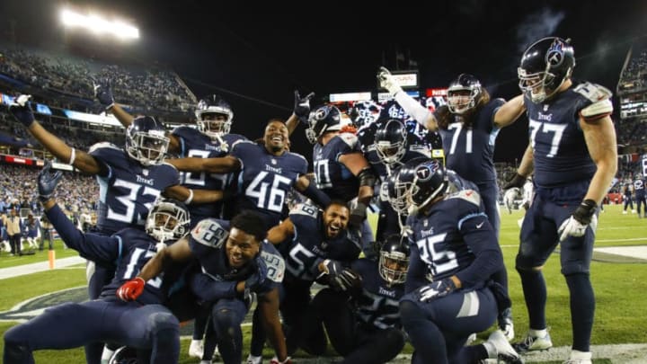 NASHVILLE, TN - DECEMBER 6: Derrick Henry #22 of the Tennessee Titans celebrates a touchdown with his teammates during the fourth quarter against the Jacksonville Jaguars at Nissan Stadium on December 6, 2018 in Nashville, Tennessee. (Photo by Frederick Breedon/Getty Images)