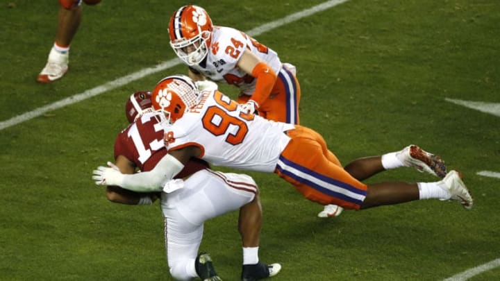 SANTA CLARA, CALIFORNIA - JANUARY 07: Clelin Ferrell #99 of the Clemson Tigers tackles Tua Tagovailoa #13 of the Alabama Crimson Tide on fourth down during the fourth quarter in the College Football Playoff National Championship at Levi's Stadium on January 07, 2019 in Santa Clara, California. (Photo by Lachlan Cunningham/Getty Images)
