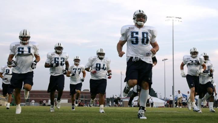 CLARKSVILLE, TN - JULY 31: The Tennessee Titans defense warms up during the Tennessee Titans Training Camp on July 31,2006 at Austin Peay State University in Clarksville,Tennessee. (Photo by Elsa/Getty Images)