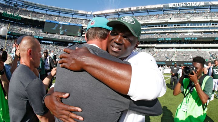 EAST RUTHERFORD, NJ - SEPTEMBER 24: Head coach Adam Gase of the Miami Dolphins and head coach Todd Bowles of the New York Jets meet at midfield after an NFL game at MetLife Stadium on September 24, 2017 in East Rutherford, New Jersey. The New York Jets defeated the Miami Dolphins 20-6. (Photo by Rich Schultz/Getty Images)