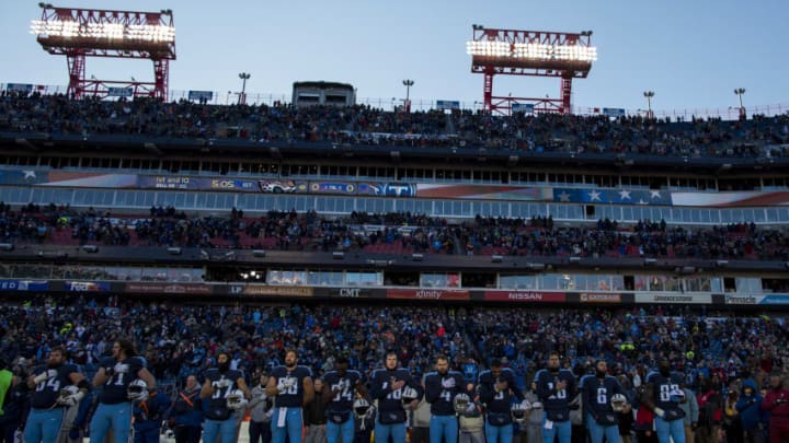 NASHVILLE, TN - DECEMBER 31: The Tennessee Titans Stand for the National Anthem before their game against the Jacksonville Jaguars at Nissan Stadium on December 31, 2017 in Nashville, Tennessee. (Photo by Shaban Athuman/Getty Images)
