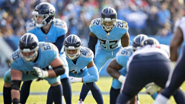 NASHVILLE, TN - DECEMBER 15: Derrick Henry #22 of the Tennessee Titans in the backfield during a game against the Houston Texans at Nissan Stadium on December 15, 2019 in Nashville, Tennessee. The Texans defeated the Titans 24-21. (Photo by Wesley Hitt/Getty Images)