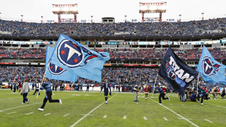 NASHVILLE, TN - DECEMBER 22: Flags are run onto the field of the Tennessee Titans before a game against the New Orleans Saints at Nissan Stadium on December 22, 2019 in Nashville, Tennessee. The Saints defeated the Titans 38-28. (Photo by Wesley Hitt/Getty Images)