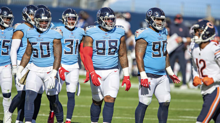 NASHVILLE, TENNESSEE – NOVEMBER 08: DaQuan Jones #90, Jeffery Simmons #98, Derick Roberson #50 and Kevin Byard #31 of the Tennessee Titans celebrates at the line of scrimmage during a game against the Chicago Bears at Nissan Stadium on November 08, 2020 in Nashville, Tennessee. The Titans defeated the Bears 24-17. (Photo by Wesley Hitt/Getty Images)