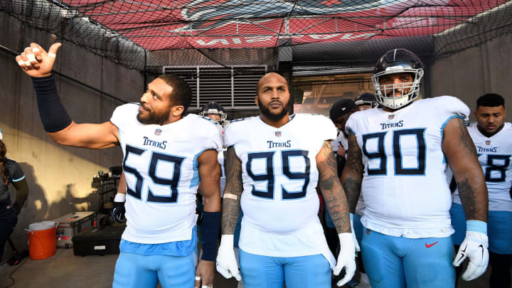 Titans linebacker Wesley Woodyard (59), and defensive tackles Jurrell Casey (99) and DaQuan Jones (90) wait to take the field for the start of the game at Nissan Stadium Saturday, Dec. 22, 2018, in Nashville, Tenn.8505898