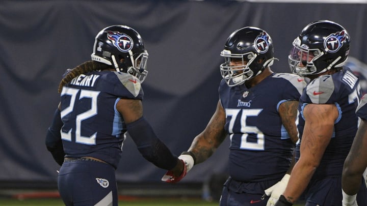 Oct 13, 2020; Nashville, Tennessee, USA; Tennessee Titans offensive guard Rodger Saffold (76) congratulates running back Derrick Henry (22) after scoring a rushing touchdown during the first half at Nissan Stadium. Mandatory Credit: Steve Roberts-USA TODAY Sports